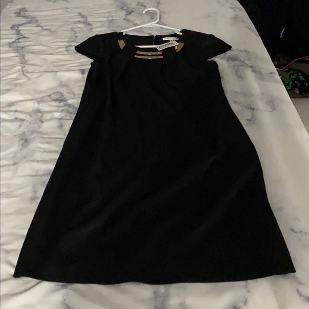 Black womens dress by Sandra Darren